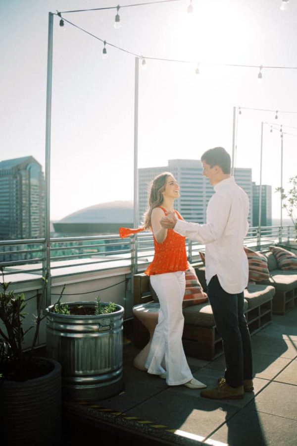 Couple Dancing in the Sun | Spring Engagement Photos in the City - ItsRiss Life