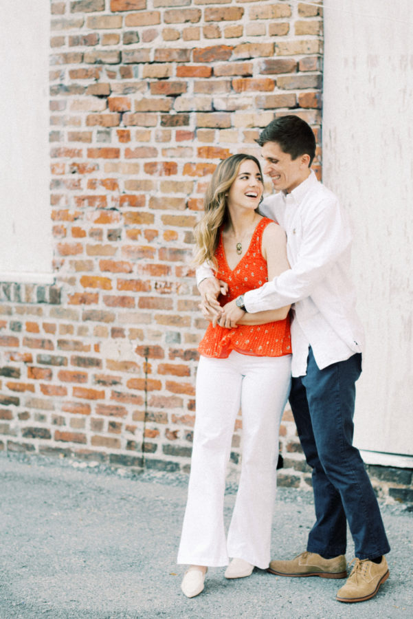 Couple Holding Each Other | Spring Engagement Photos in the City - ItsRiss Life
